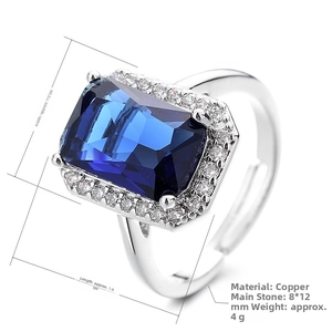 Detail of 8x12MM rectangular blue gemstone ring with crystal halo on silver copper band