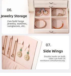 Detail of drawer compartments and side wing with ten necklace hooks in jewelry box