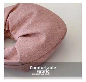 Detailed macro view showing soft knit texture of the stylish denim pink hobo bag accessory