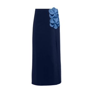 Detail of 3D fabric flower ornaments on the side of a navy blue straight maxi skirt
