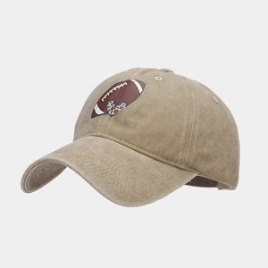 Detailed side view of khaki washed baseball cap featuring a leopard heart rugby print