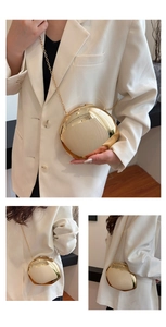 Chic gold spherical acrylic evening bag with chain strap shown in various wearing styles