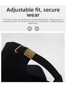 Detail of adjustable metal buckle on black canvas baseball cap for custom fit sizing