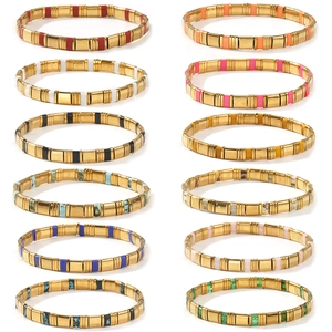 Set of 12 colorful Tila bead stretch bracelets with gold plating and waterproof beads