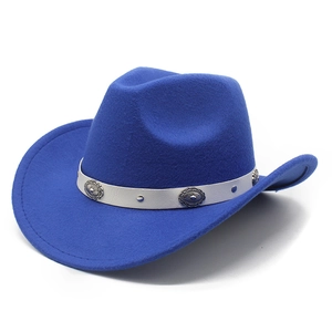 Close-up of royal blue cowboy hat featuring a white leather band and silver metal studs