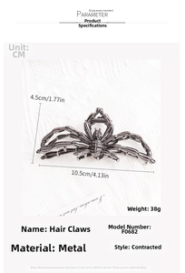 Detail of a large spider-shaped metal hair claw clip with dark gunmetal finish and measurements