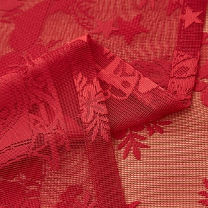 Nappe de Noël en dentelle rouge avec motifs brodés de rennes et de flocons de neige
