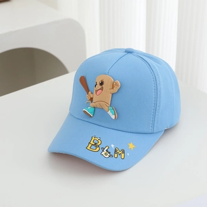 Detail of light blue baseball cap featuring 3D cartoon woodman and B&M embroidery