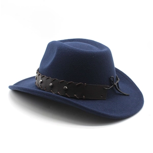 Detail of dark blue felt cowboy hat featuring brown leather band with silver metal rivets