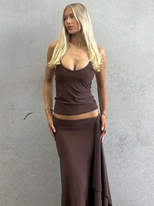 Women's dark brown two-piece set featuring halter crop top and ruched maxi skirt