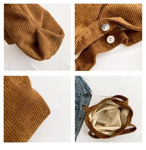 Detail of brown corduroy tote bag showing magnetic buckle and inner fabric lining