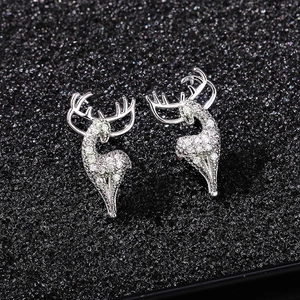 Detailed close-up of reindeer stud earrings with sparkling silver zircon stones