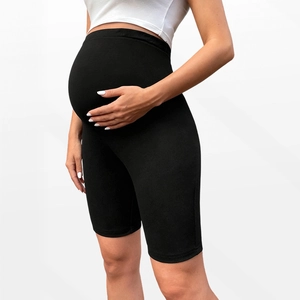 High waist maternity bike shorts in black stretch fabric for belly support and comfort