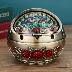 Spherical bronze ashtray with peacock relief and windproof lid for home decor