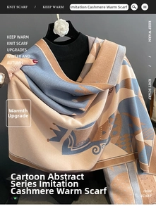 Detail of soft faux cashmere scarf with cartoon poker patterns in beige and blue