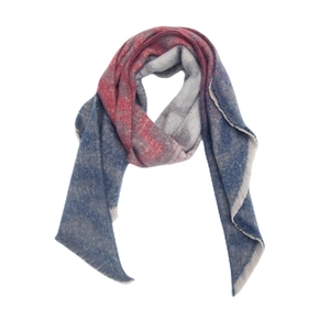 Macro shot of red and blue gradient scarf with boucle yarn jacquard zebra pattern fringe