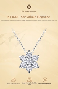 Macro shot of 925 sterling silver snowflake pendant with sparkling moissanite stones