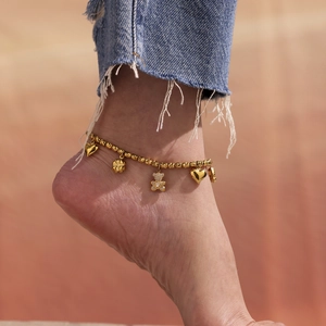 Golden bead anklet for women with heart cross and zircon teddy bear charms