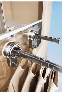 Detail of suction cup clothes rack with non-slip hanging holes on metal telescopic rod