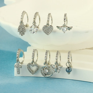 Silver 20G nose rings set with teardrop zircon and celestial pendants for body piercing