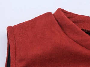 Macro shot of dark red suede dress shoulder showing fine stitching and soft fabric texture