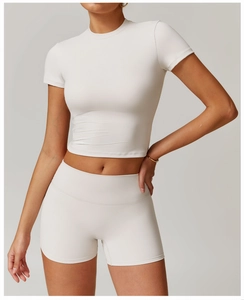 Close-up of seamless high-waist yoga shorts and cropped top in elastic brushed fabric