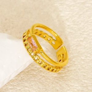 Detailed close-up of a double-layer gold open ring with a rectangular pink zircon stone