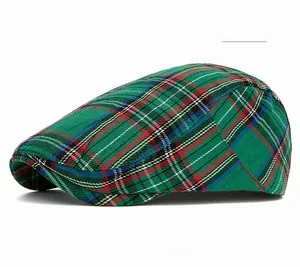 Detailed side view of military green plaid newsboy cap with classic tartan pattern