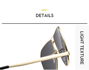 Detail view of gold metal frame and grey lenses on lightweight pilot sunglasses