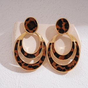 Vintage leopard print earrings with gold metal frames in layered oval geometric design