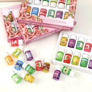 Set of 12 water-soluble essential oil bottles in pink box with floral design