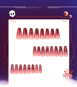 Detail of square gradient Halloween press-on nails with sparkling red rhinestones