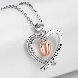 Silver heart necklace for Mom with rose gold baby footprints and crystal accents