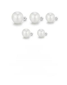 Macro shot of five pairs of S925 silver stud earrings with gradient-sized white pearls