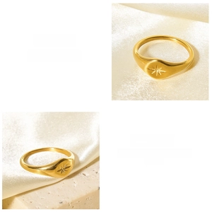 Detail view of 18K gold plated hexagram signet ring with polished metallic finish