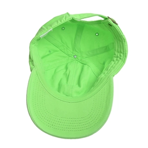 Interior detail of neon green cotton baseball cap showing sweatband and washing label