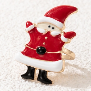 Macro shot of an adjustable enamel ring featuring a detailed Santa Claus holiday design