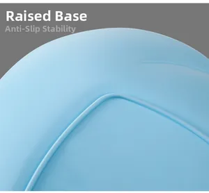 Detail of the raised non-slip base on this light blue plastic four-leaf clover snack tray