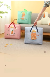 Close-up of waterproof Oxford fabric bags with cute cartoon animal prints and sturdy straps