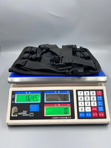Detailed view of heavy-duty tactical tool belt weight measurement showing 164.5g on a scale