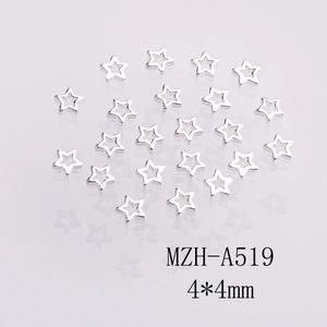 Detail of 4x4mm silver hollow star nail charms for DIY manicures and jewelry art