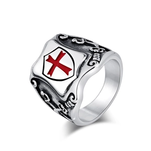Vintage stainless steel knight shield ring with cross engraving shown at a 45-degree angle