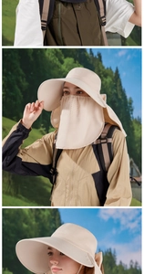 Close-up of beige sun hat with breathable face mask and detachable neck protection cover