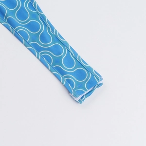 Detailed close-up showing blue and white abstract wavy patterns on high-quality elastic fabric