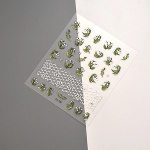 Macro detail of Co-199 3D embossed lily of the valley and pearl floral nail art sticker