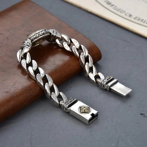 Bracciale retrò a catena d'argento con rilievo testa di leone oro su pelle