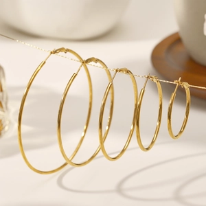 Exaggerated 18K gold-plated stainless steel hoop earrings in four assorted sizes