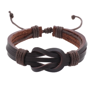Brown braided leather bracelet featuring a central infinity knot and adjustable drawstring