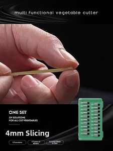 Detail of 4mm shredding blade in use with a multifunctional kitchen slicer set