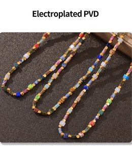 Detail of PVD electroplated beads and natural colorful stones in a bohemian style necklace
